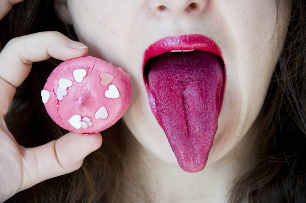 Sexual lips with candy, sexy sweet dreams. Attractive female mouth licks meringue, sucks lollipop - Photo, Image