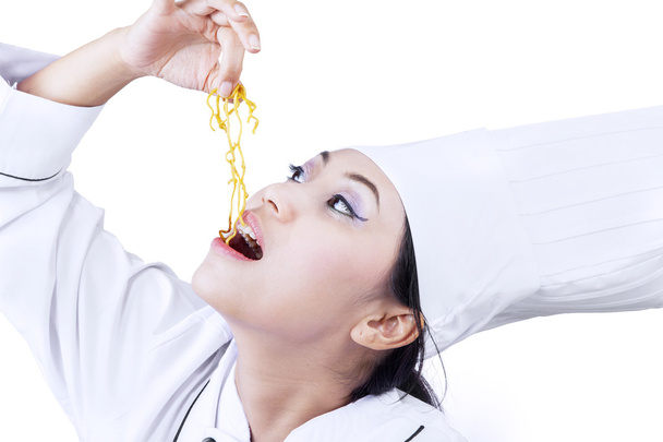 Asian chef eat noodle on white - Fotoğraf, Görsel
