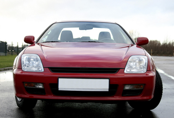 rode auto voorzijde - Foto, afbeelding