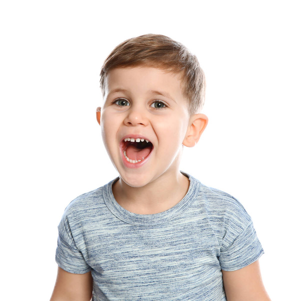 Portrait of little boy laughing on white background - Фото, изображение