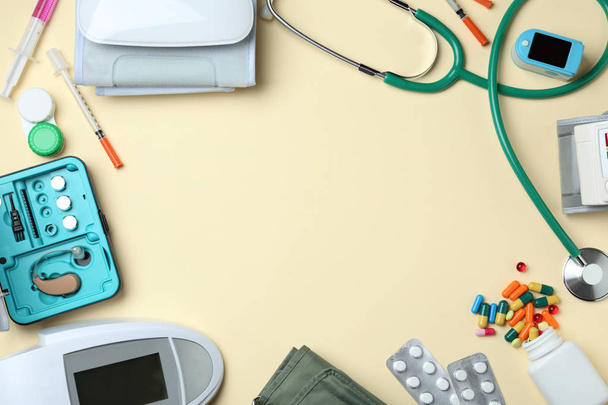 Flat lay composition with different medical objects and space for text on color background - Foto, Imagen