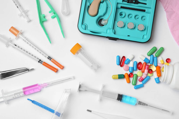 Flat lay composition with different medical objects on white background - Foto, imagen