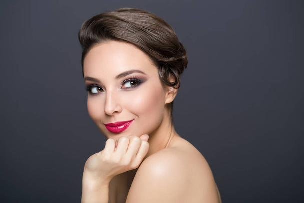 Portrait of a gorgeous brunette in elegant makeup. - Photo, image