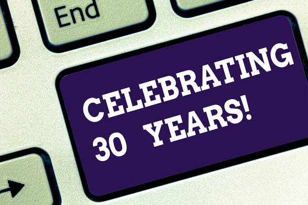 Handwriting text Celebrating 30 Years. Concept meaning Commemorating a special day being 30 years together Keyboard key Intention to create computer message pressing keypad idea. - Photo, Image