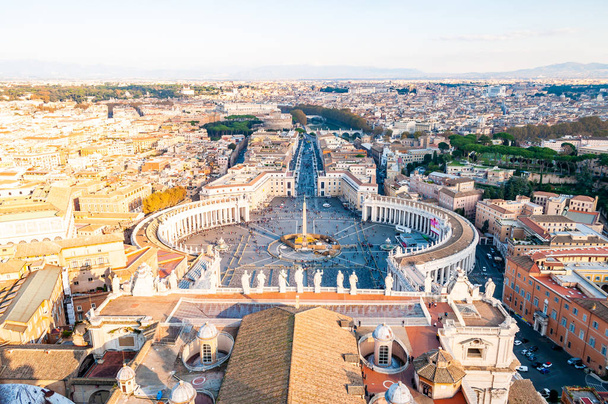 Vatican, Rome, Italy - November 16, 2018: View from above on the famous St. Peter's Square, Piazza San Pietro is a large plaza located directly in front of St. Peter's Basilica in the Vatican City - Photo, Image