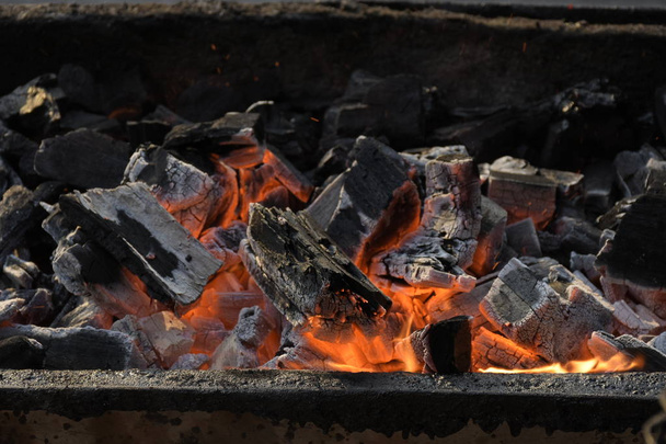 Charcoal fire stove cinder. - Фото, изображение