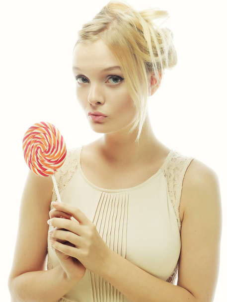 fashion blond woman  holding lollipop - Fotó, kép
