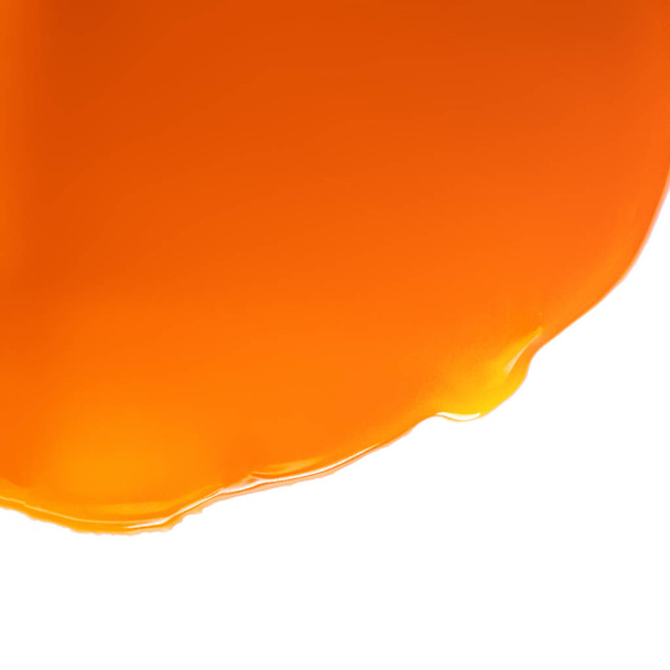 Abstract Caramel  Background. Flowing caramel sauce isolated  - Fotoğraf, Görsel