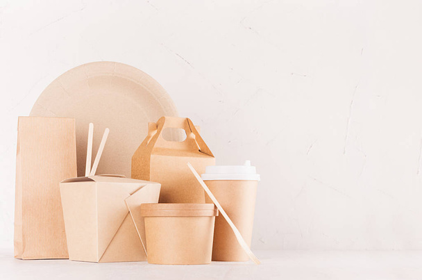 Mockup food takeaway packaging for cafe and restaurant -   blank container, box, bowl for food, drink, packet, chopsticks of brown paper on white wood table. - Foto, Imagen