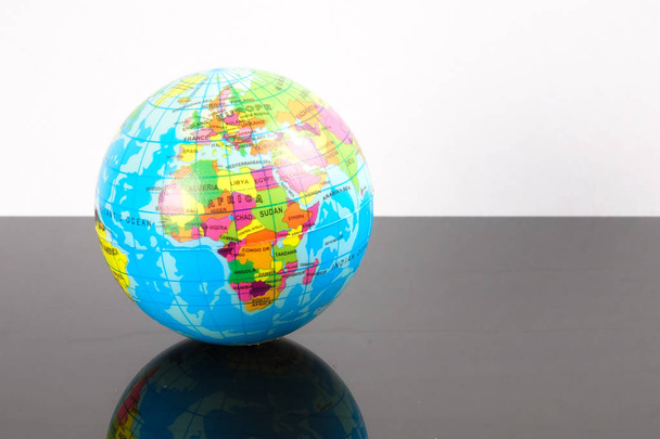 World globe with reflection. Globalization Concept - Photo, Image