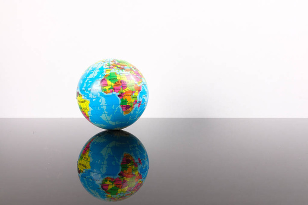 World globe with reflection. Globalization Concept - Foto, Imagen