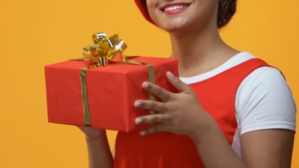 Cheerful young woman holding present hands, occasion gift, anniversary surprise - Filmagem, Vídeo