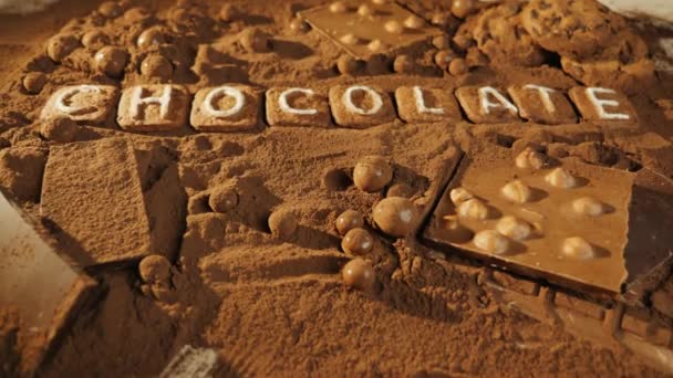 Czekoladowe wiadomość na tle kakao - Materiał filmowy, wideo