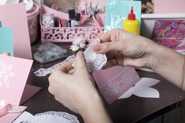 Making greeting cards from paper, cardboard and tape. Woman artisan at work. - Fotografie, Obrázek