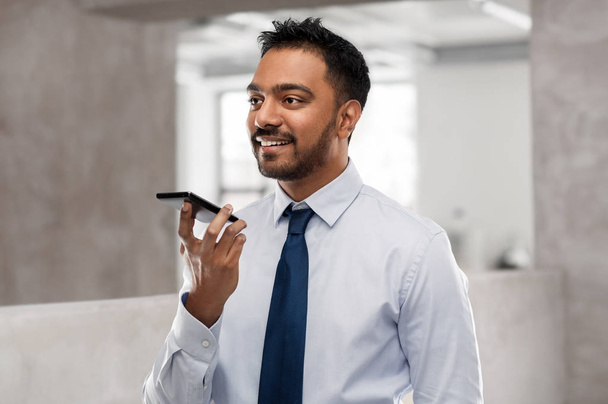 businessman using voice command on smartphone - Фото, зображення