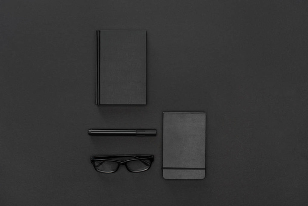 Top view of notebooks, pen and glasses - Photo, Image