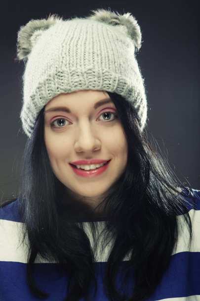 young woman in funny winter hat - Фото, изображение