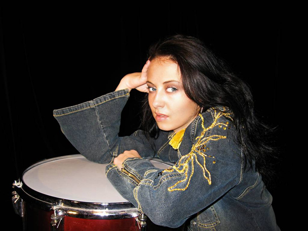 drum school. drum kit. musical instruments. lets play rock music. jeans jacket with gold. sexy woman drummer isolated on black. learn drumming. music is my life. Sexy rock girl singer has fashion look - Zdjęcie, obraz