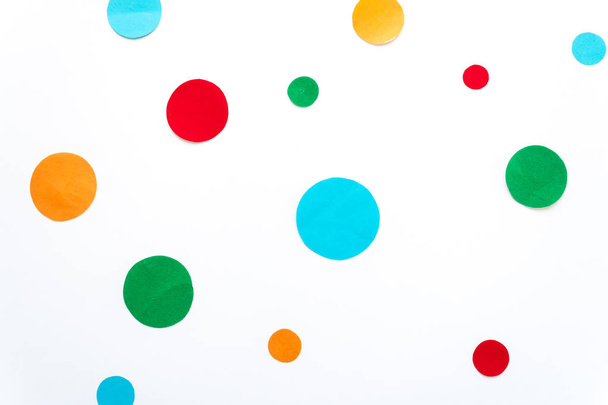 cut out different colored circles on a white background - Φωτογραφία, εικόνα