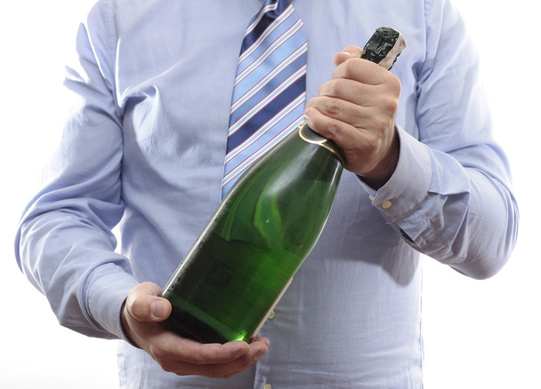 Businessman with bottle of Champagne - Photo, Image