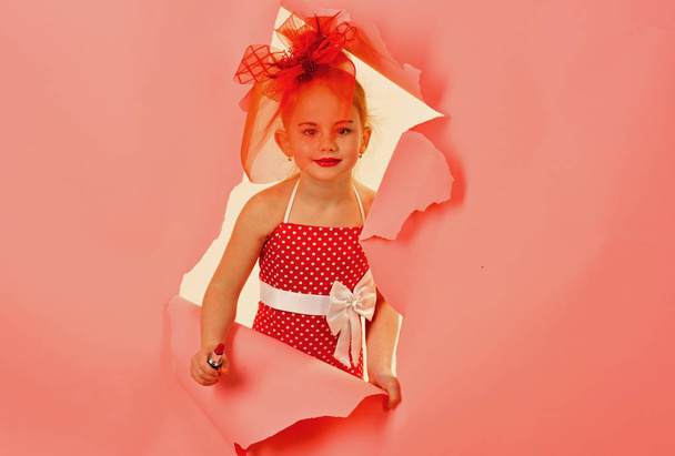 Child girl in stylish dress, makeup. child girl on pink background - Fotografie, Obrázek