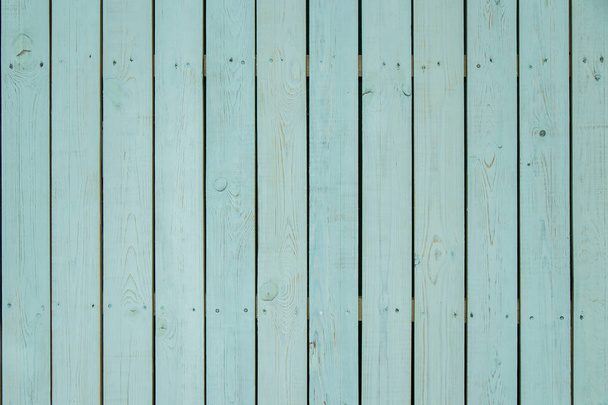 Achtergrond van de turquoise houten planken. Lichte achtergrond of textuur voor uw ontwerp. - Foto, afbeelding