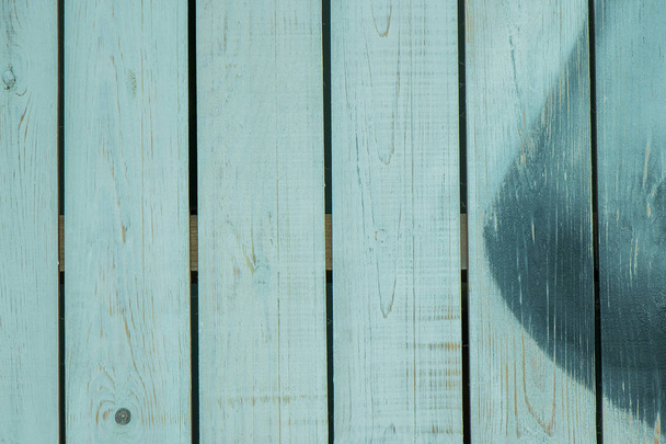 Achtergrond van de turquoise houten planken. Lichte achtergrond of textuur voor uw ontwerp. - Foto, afbeelding
