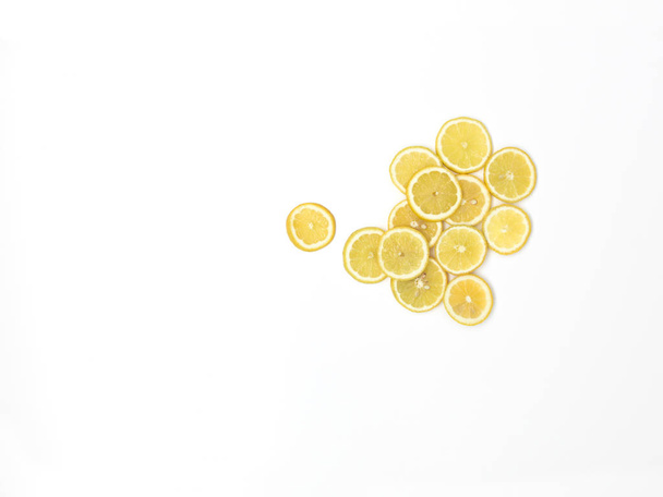 beautifully arranged fresh lemon slices isolated on white background, close-up  - Zdjęcie, obraz