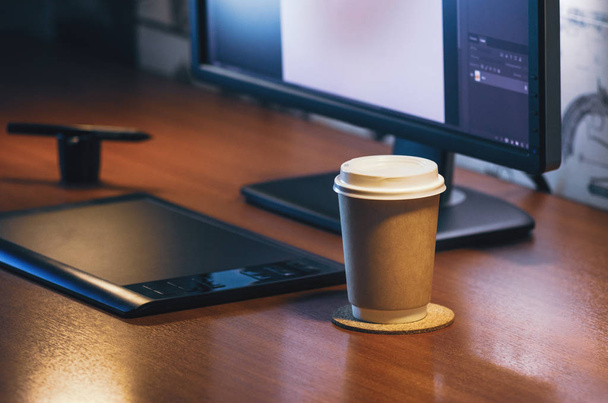 Desktop side view. Computer Graphics Tablet Diary Cup of coffee. Concept for website banner, mockup, background, presentation and marketing material - 写真・画像