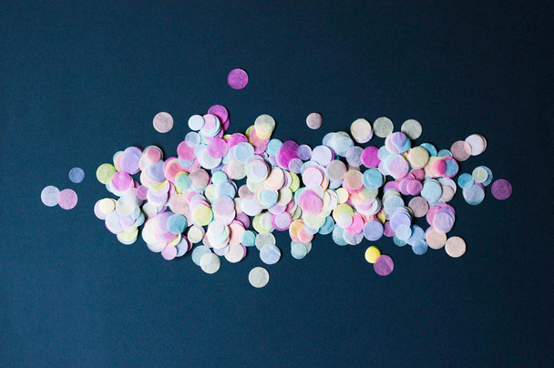 Abstract dark background with light multi-colored round confetti. There is a place for text. - Фото, зображення