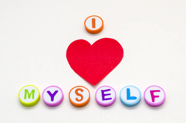 I love myself phrase made from colorful circles with letters and a red heart against white background - Photo, Image