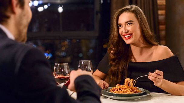 Romantic dinner in italian restaurant concept - Фото, изображение