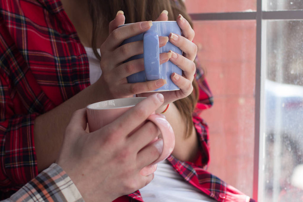 Boy and girl having coffee together. - Фото, зображення