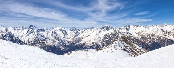 DOMBAY, RUSSIA - May 03.2015: One of the mountains in the climatic and ski resort Dombay. Panorama - Foto, immagini