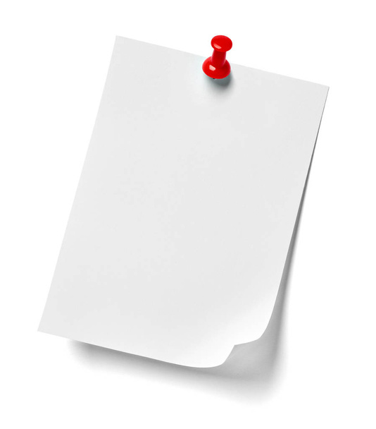 close-up van een briefpapier met een rode drukknop op witte achtergrond - Foto, afbeelding