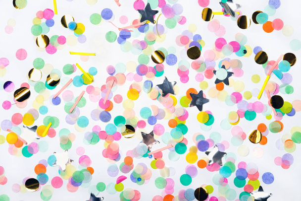 Colorful scattered confetti on white - Φωτογραφία, εικόνα