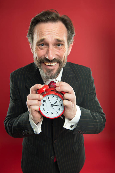 Time is merciless. Businessman formal suit hold alarm clock. Deadline concept. Last minute. Time management. Schedule personal plan and discipline. Man handsome worry about time gone. Counting time - Photo, image