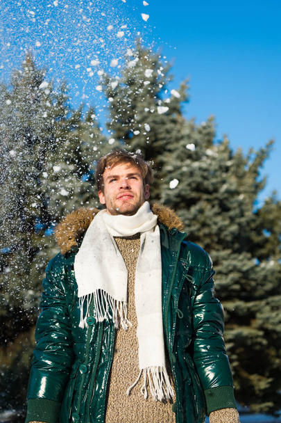 man on winter holidays. Vacation and traveling. Man. It is cold outside. Forest in snow. Fresh air. Snowy weather. Trendy winter coat. Winter fashion. Warm clothes. Starting new day with fresh air - Foto, immagini