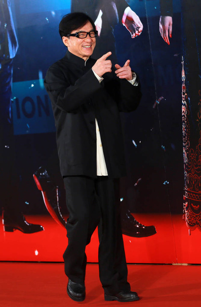 Hong Kong action star Jackie Chan poses on the red carpet for the 33rd Hong Kong Film Awards in Hong Kong, China, 13 April 2014 - 写真・画像