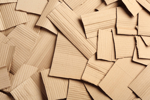 Pieces of cardboard as background, top view. Recycling concept - Foto, Imagem