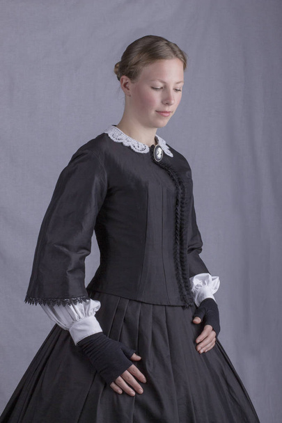 Victorian woman in black ensemble - Photo, Image