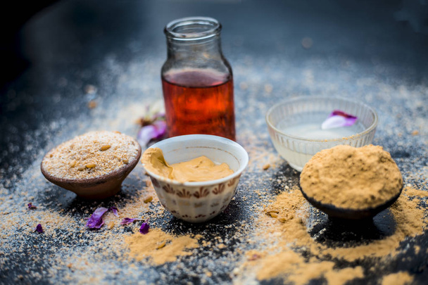 Ingredients for face mask of oats powder, rose water and lemon juice  - Фото, зображення