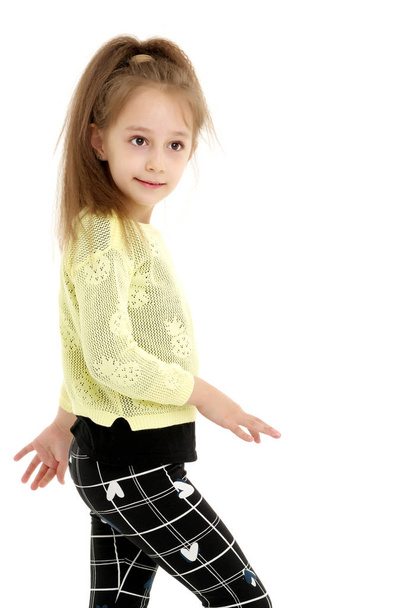 Little girl posing in the studio. Close-up. - Фото, изображение
