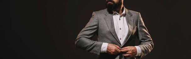 cropped view of beard businessman in grey jacket isolated on brown - Fotó, kép