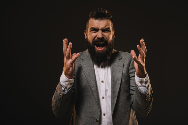 aggressive beard businessman gesturing and screaming isolated on brown - Φωτογραφία, εικόνα
