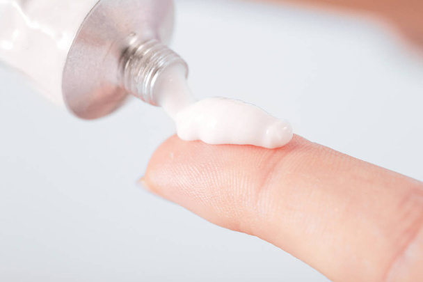 Close up image of hands with cream tube - Foto, immagini