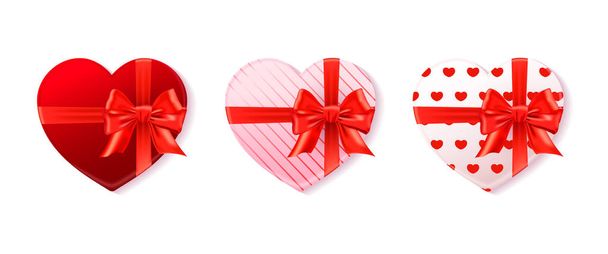 Vector illustration of a set of heart gift boxes with a bow isolated on white. Element for Valentines day, wedding, romantic designs - Vector, Image