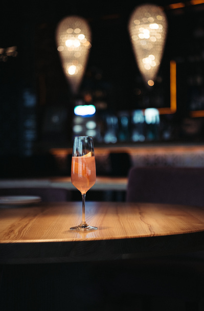 selective focus of pink alcoholic cocktail on dark background with copy space - 写真・画像