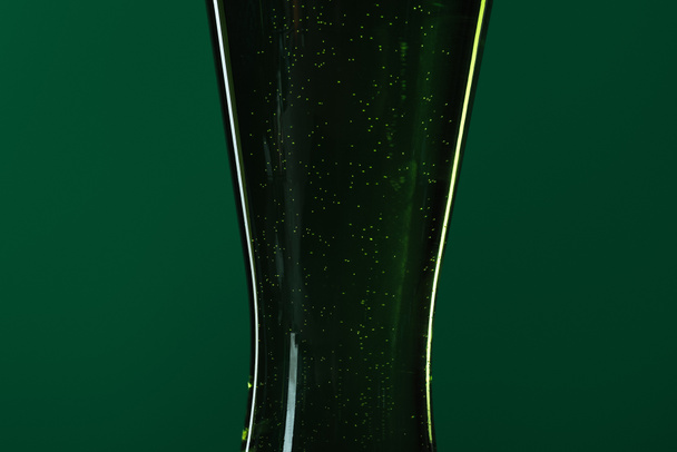 close up of beer glass isolated on green, st patrick day concept - Photo, Image