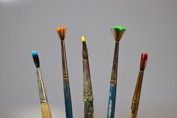 brushes and paints in a row - Foto, immagini